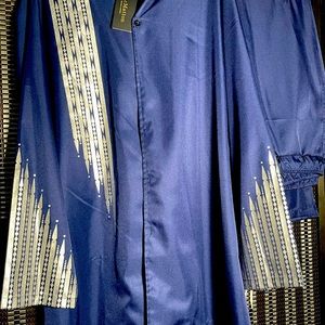 A men top and pants set. Very cool material! With detailed silver embroidery